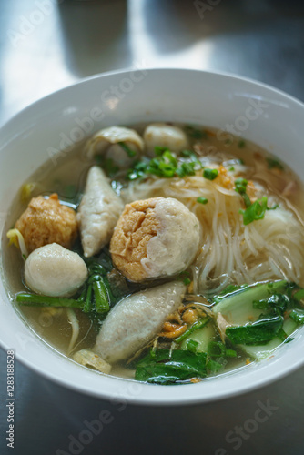 Fish line in white bowl, Fish ball noodle soup recipe. Top view