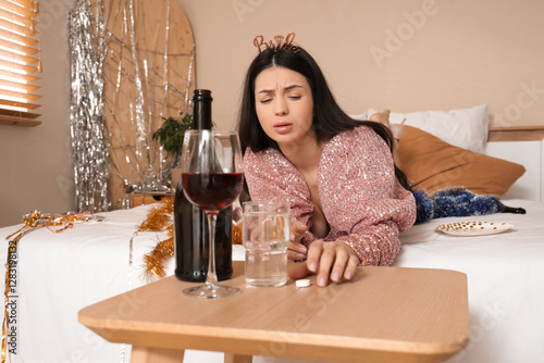 Young bride taking pill aft...