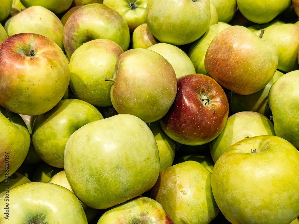 Fresh apples displayed in a vibrant market environment, showcasing a variety of colors and textures Fresh apples displayed in a vibrant market environment, showcasing a variety of colors and textures