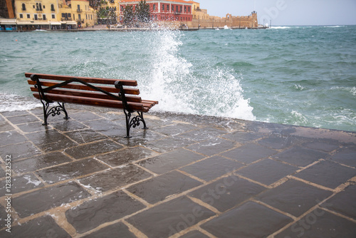 Splashes of sea against the background of the old town.
Bench in front of the lighthouse,
Faros - lighthouse in Chania