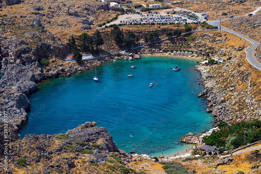 Obraz premium Aerial View of the Iconic Heart-Shaped St. Paul’s Bay from the Top of Lindos Acropolis, Rhodes, Greek Islands