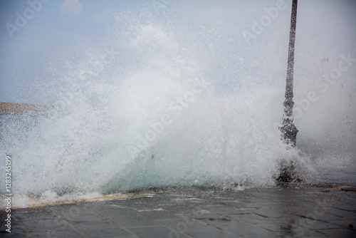 Splashes of sea against the background of the old town.
Bench in front of the lighthouse,
Faros - lighthouse in Chania