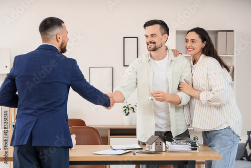 Male real estate agent and ...