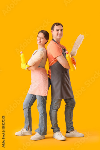Young couple with cleaning ...