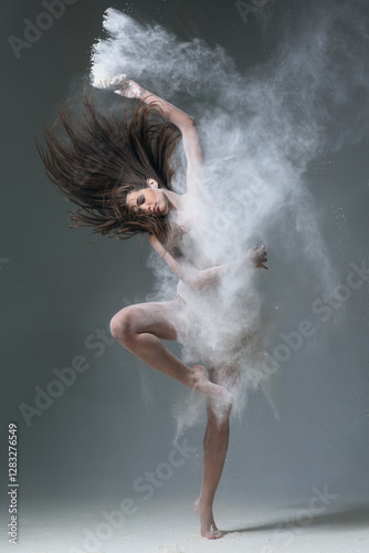 Plakat Dancing in flour dancer posing on a studio background