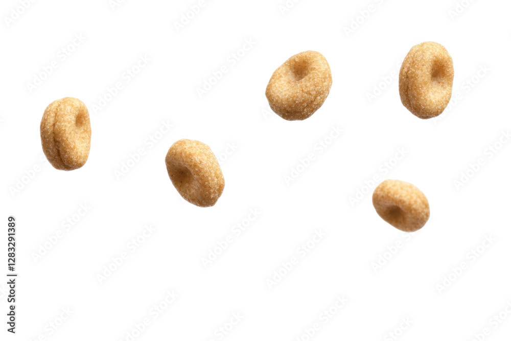 Brown cereal pieces flying in mid-air, cut out Brown cereal pieces flying in mid-air, cut out