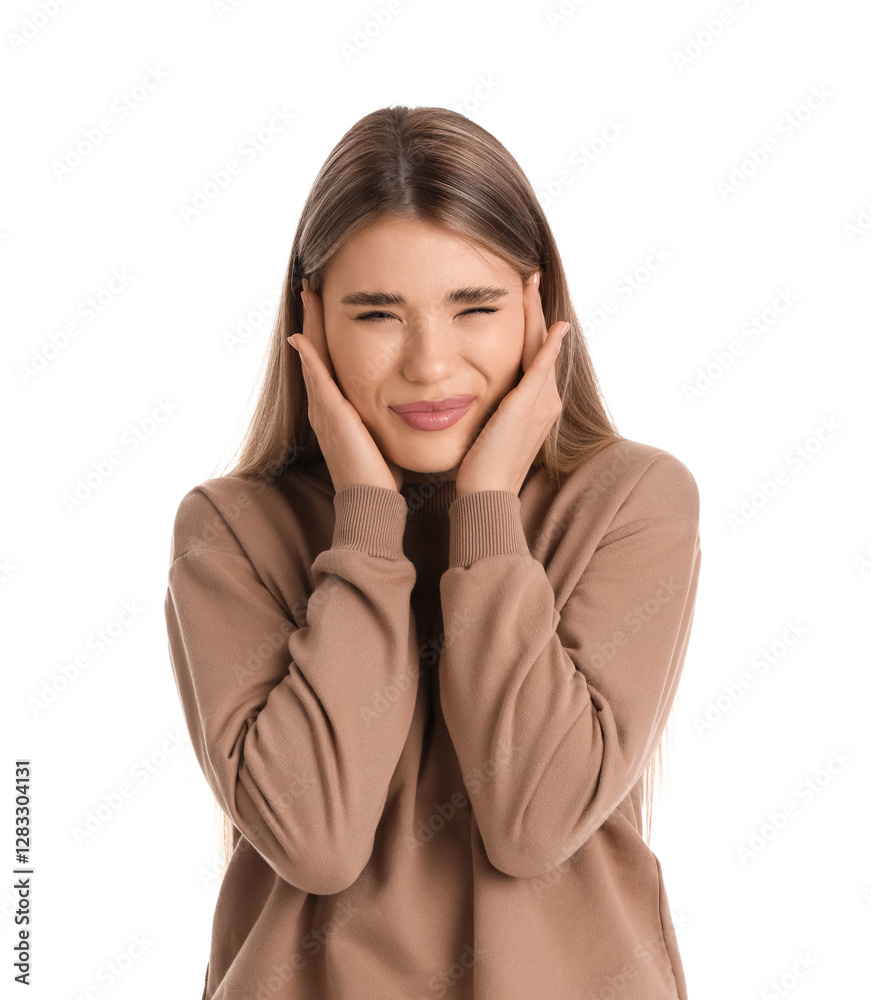 Young woman suffering from loud noise on white background Young woman suffering from loud noise on white background