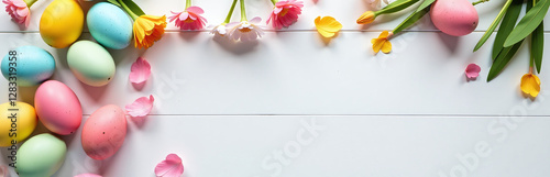 Colorful Easter Eggs And Spring Flowers Decorate A White Table With Feathers In A Festive Holiday Scene. 00001 photo