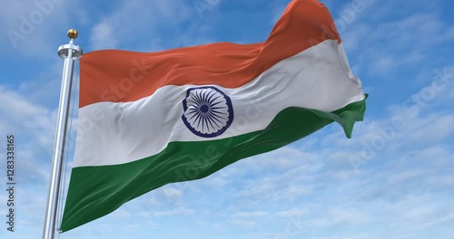 India flag with flagpole waving in wind, rolling clouds background looping, 4K video (Perfect Loop)