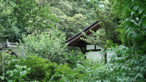 The old Chinese house built with the straw grass