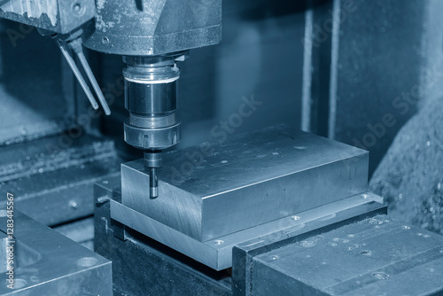 Photography The operation of edge finder for center setup for CNC milling machine