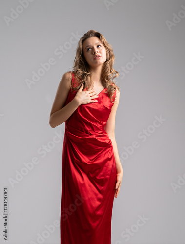 Elegant woman in red evening dress