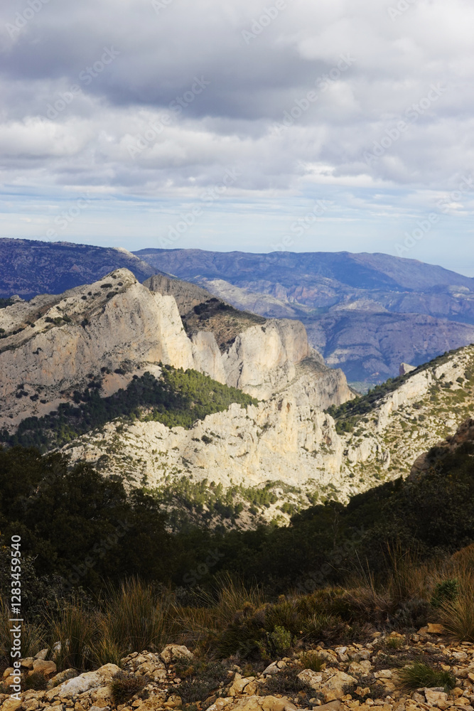 The mountain panorama opening from the hiking path to pick Puig Campana, Finestrat, Benidorm, Spain The mountain panorama opening from the hiking path to pick Puig Campana, Finestrat, Benidorm, Spain