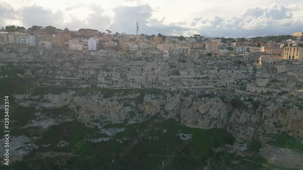 Aerial drone view of the old city center in Matera, southern Italy. Aerial drone view of the old city center in Matera, southern Italy.