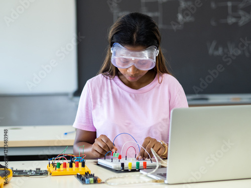 Teenage African American Girl in Technology Class with Electric Circuits