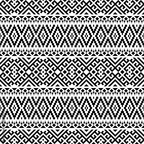 Repeating black and white geometric lines and squares form a seamless horizontal pattern, inspired by Navajo and tribal designs. Perfect for prints, packaging, and web backgrounds