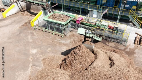 Wood sawmill, machinery for processing wood. Processing plant. Production of Wood Chips for shipment