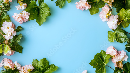Flat Lay of Delicate Spring Flowers Arranged Around Copy Space