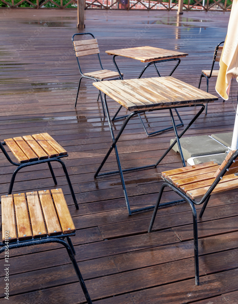 Wooden deck with a table and chairs Wooden deck with a table and chairs