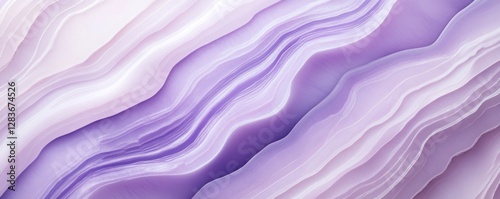 A captivating ametist texture features subtle purple waves and gradients flowing across the surface. This design provides an elegant backdrop ideal for artistic expressions and calming settings photo