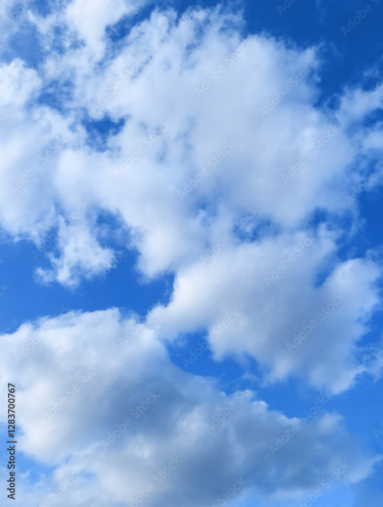 Cloudscape – White Clouds in a Bright Blue Sky, Natural Background. Blue Heaven with Clouds Cloudscape – White Clouds in a Bright Blue Sky, Natural Background. Blue Heaven with Clouds