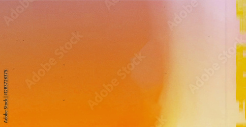 Abstract blurred film texture background with grain, dust and light leak. 