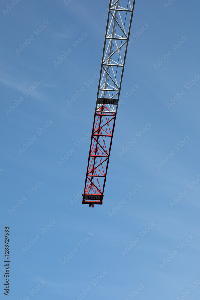 A crane is standing tall in the sky, A crane is standing tall in the sky,