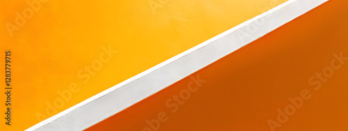 A close-up of an orange background with white lines and curves
