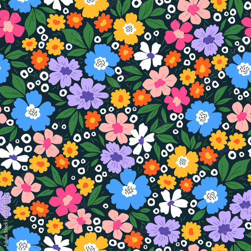Bright floral pattern. Pretty flowers on
dark blue background. Printing with
small colorful flowers. Ditsy print.
Seamless vector texture Spring
bouquet. Vintage template for fashion
prints. Stock