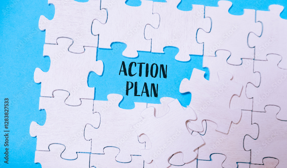 Puzzle with a piece missing and the word action plan written in the gap Puzzle with a piece missing and the word action plan written in the gap