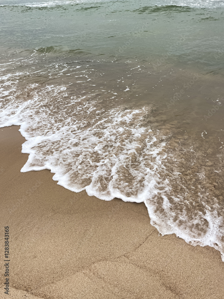 Wet sand and wave of sea. Natural background. Wet sand and wave of sea. Natural background.