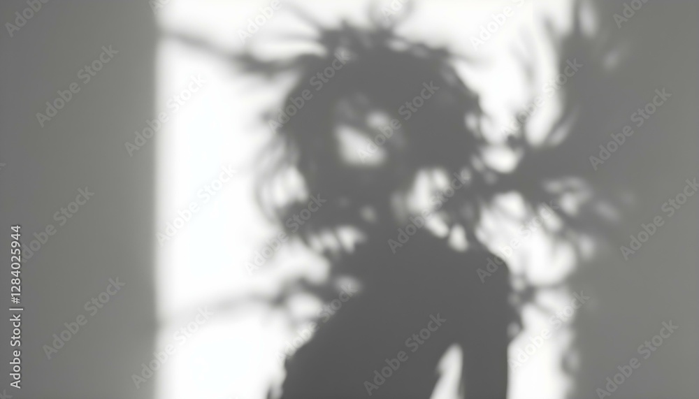 Shadow Play: A Silhouette of a Person with Long, Wavy Hair
