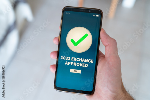 1031 exchange approved notification on smart phone.
