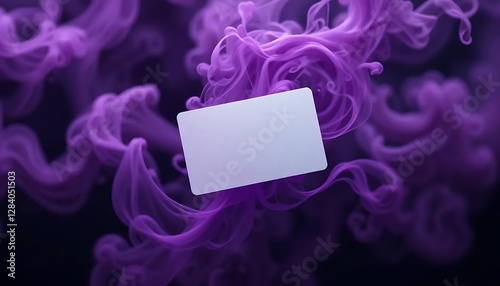 White business card centered on a swirling black smoke background, creating a striking, modern contrast, ideal for professional branding or contact information.