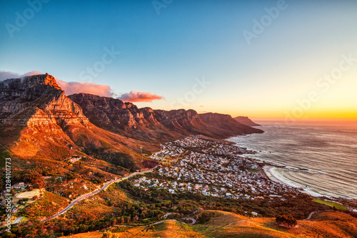 Cape Town Sunset over Camps Bay Beach with Table Mountain and Twelve Apostles in the Background