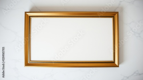 Elegant gold frame on marble backdrop, ready to showcase your cherished memories or artwork in style.
