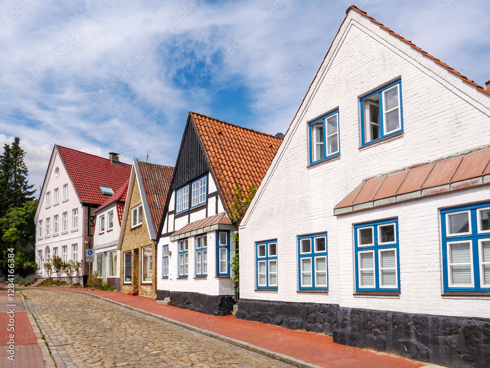 Half-timbered houses with gable roofs in Dehnthof, Kappeln along Schlei Fjord, Schleswig-Holstein, Germany Half-timbered houses with gable roofs in Dehnthof, Kappeln along Schlei Fjord, Schleswig-Holstein, Germany