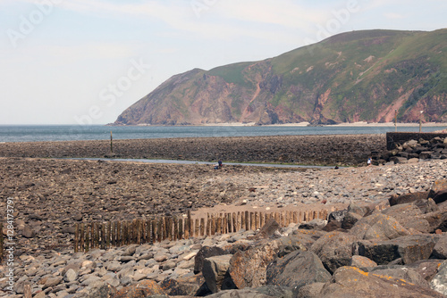 View across the entrance to Lynmouth Harbour towards Foreland Point, Devon, England

