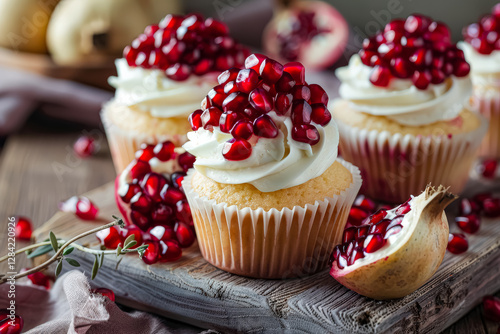 Three cupcakes with red frosting and white frosting on top