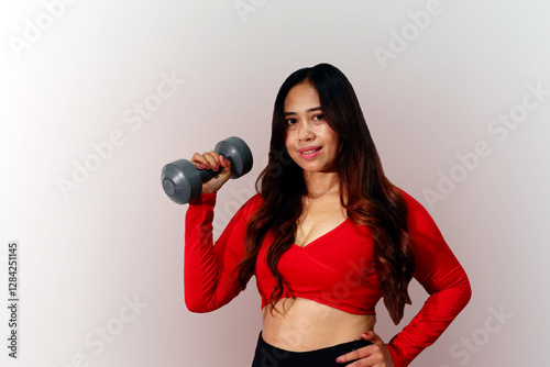 Asian Happy woman work out with dumble isolated on white background. photo