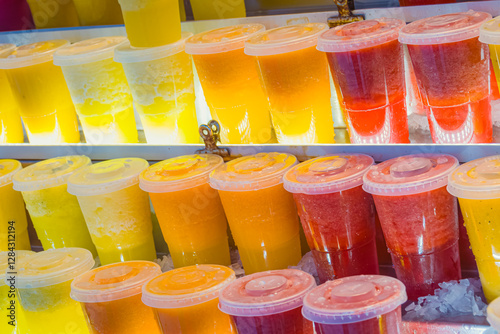 Wallpaper Mural Vibrant Freshness: A Rainbow of Smoothies at Bolhão Market, Porto Torontodigital.ca