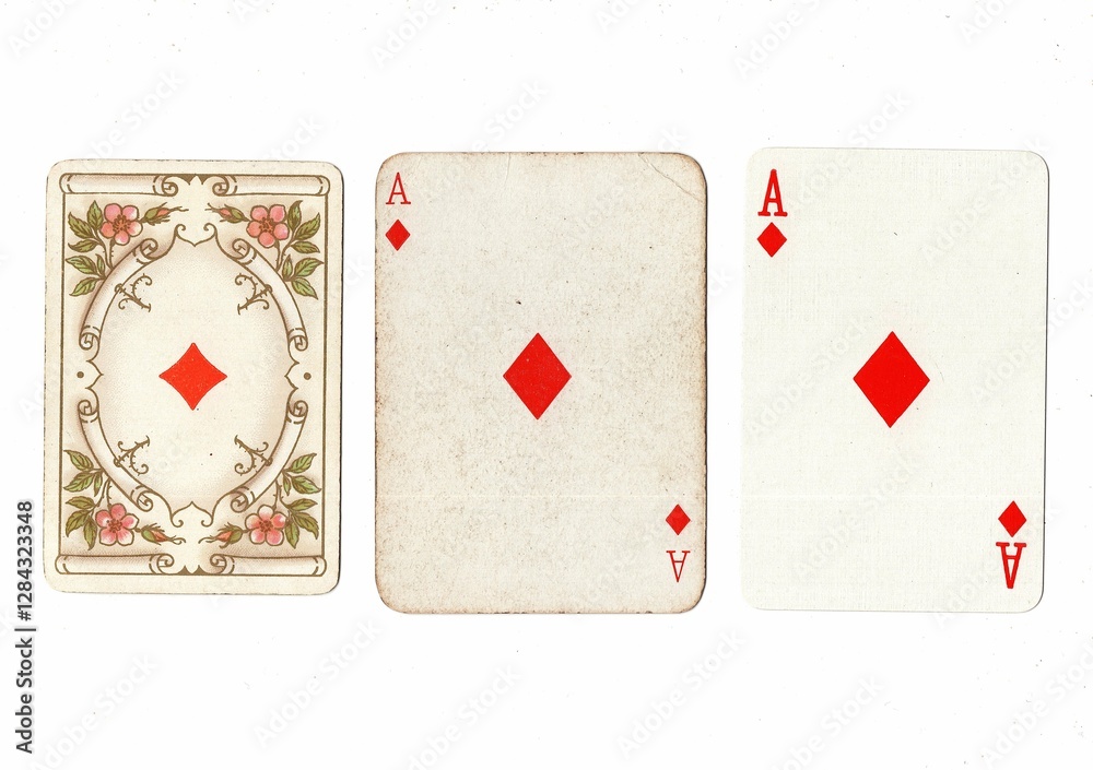 Obraz premium Three vintage playing cards of the same vale in different designs on a white background.