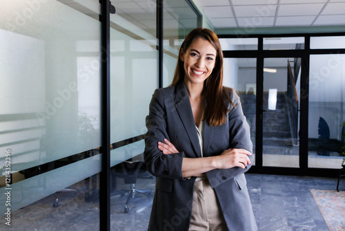 Confident businesswoman in modern office.