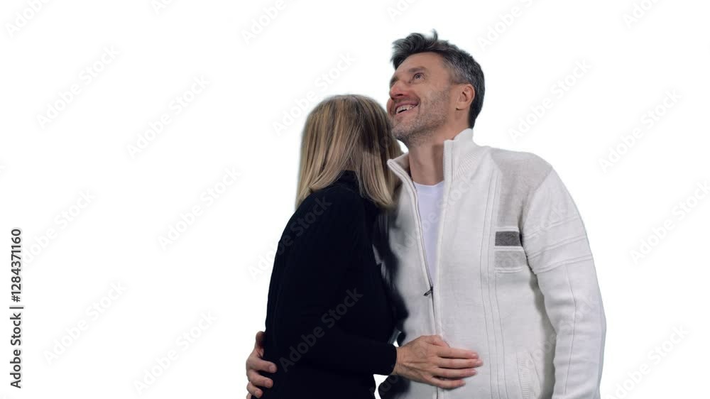 Happy smiling mid adult loving couple looking at something, Full HD footage with alpha transparency channel isolated on white background Happy smiling mid adult loving couple looking at something, Full HD footage with alpha transparency channel isolated on white background