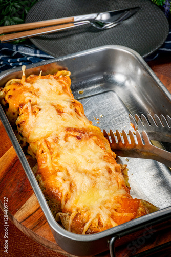 Stuffed pancake baked with cheese.