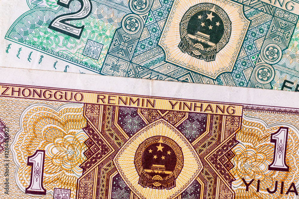 Naklejka premium Banknote 2 Jiao. Fragment of a banknote for design. Paper money of China.