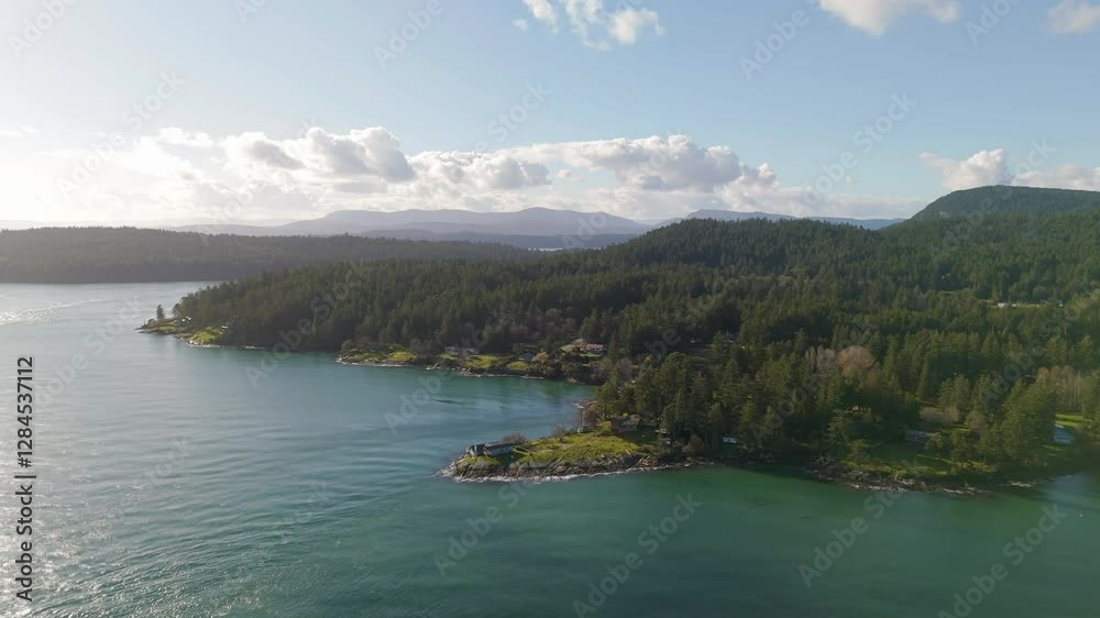 Peaceful coastal living on a beautiful island. Features ocean views, green forests, and a tranquil atmosphere. Perfect for travel, nature, or lifestyle projects. British Columbia, Canada.