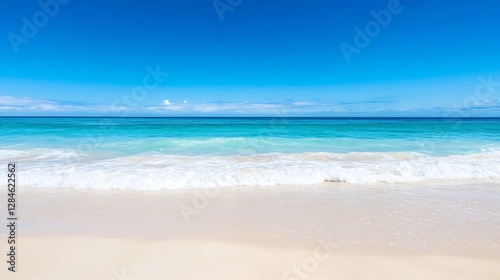 Tranquil view of a pristine beach under a bright blue sky showcasing soft white waves on golden sand : Generative AI