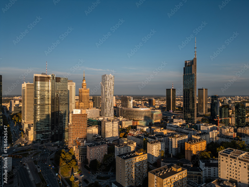 Obraz premium downtown of big capital city with skyscraper towers and modern tall office buildings, skyline and contemporary architecture of financial district, Warsaw, Poland, aerial top view