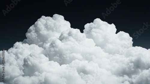 Massive Cumulus Clouds Against Dark Sky. Possible Use Stock Photo photo